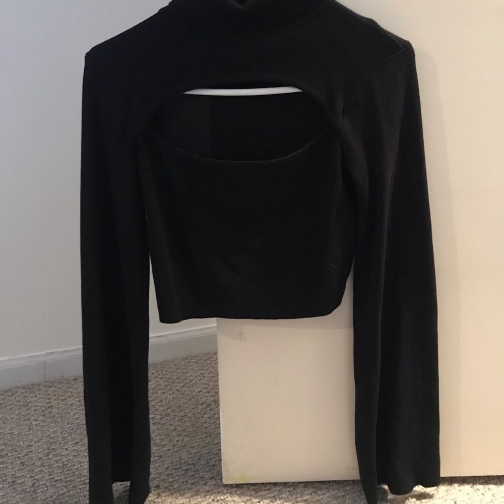 Black turtleneck with cutout